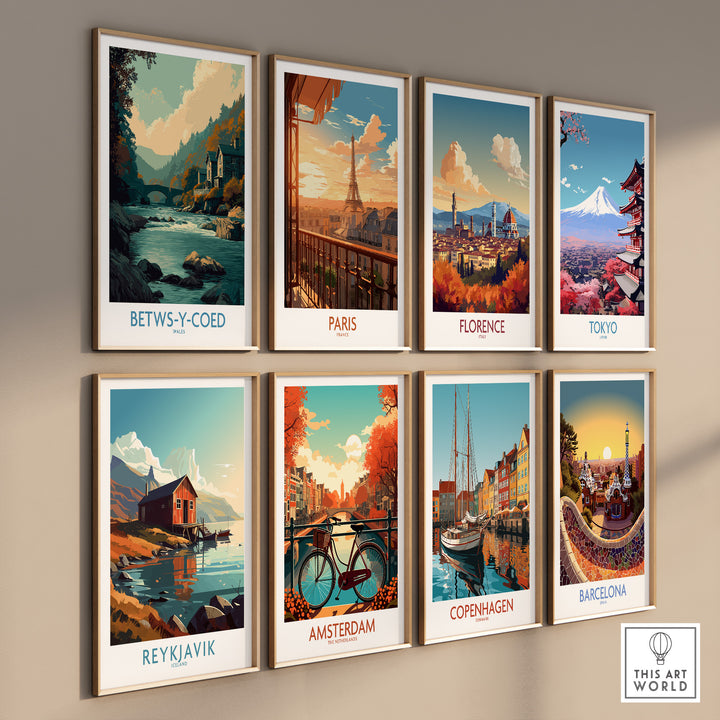 Wall display of art prints featuring Betws-y-Coed, Paris, Florence, Tokyo, Reykjavik, Amsterdam, Copenhagen, and Barcelona.