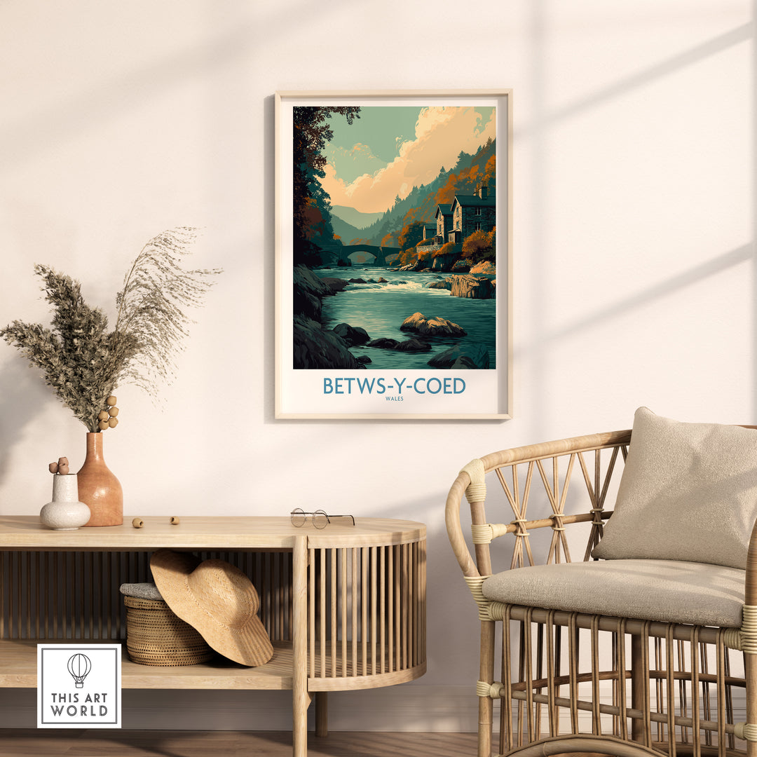 Framed Betws-y-Coed art print featuring scenic Welsh landscapes in a cozy interior setting.