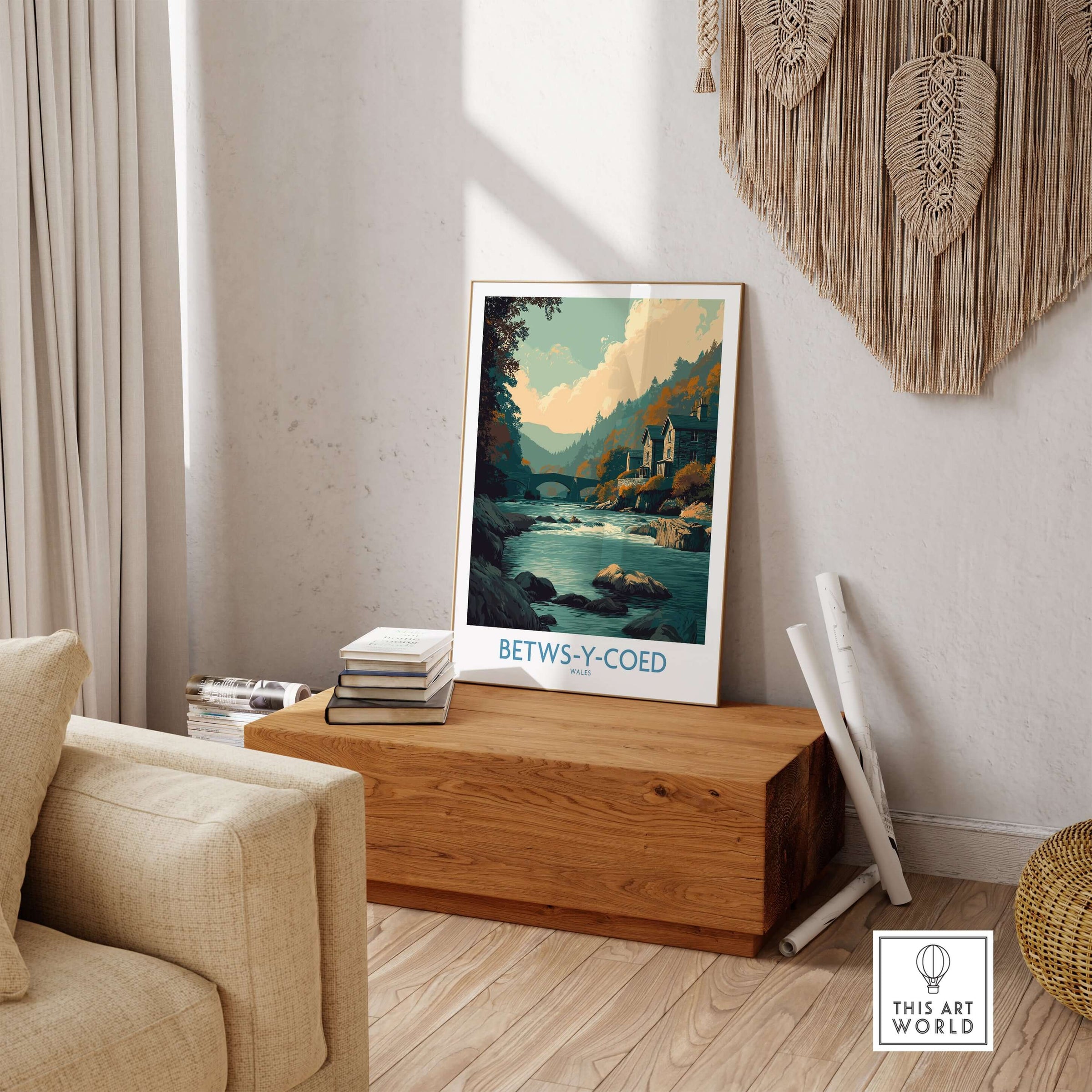 Betws-y-Coed Poster Wales Art Print displayed in a cozy living room, showcasing natural beauty and rustic elegance.