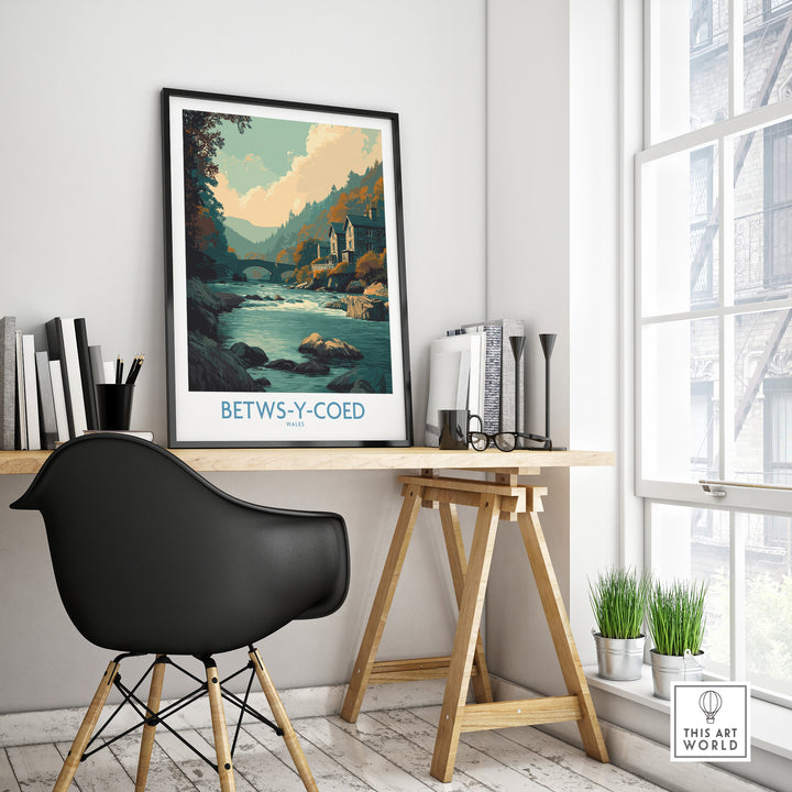 Betws-y-Coed poster in a home office, showcasing Welsh landscapes and artistic charm.