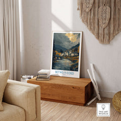 Betws-y-Coed Poster Wales Countryside Landscape Print displayed in a cozy living room setting.