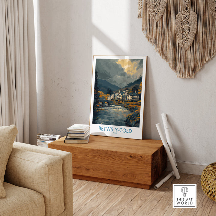 Betws-y-Coed poster showcasing a serene Welsh countryside landscape in a cozy home interior setting.