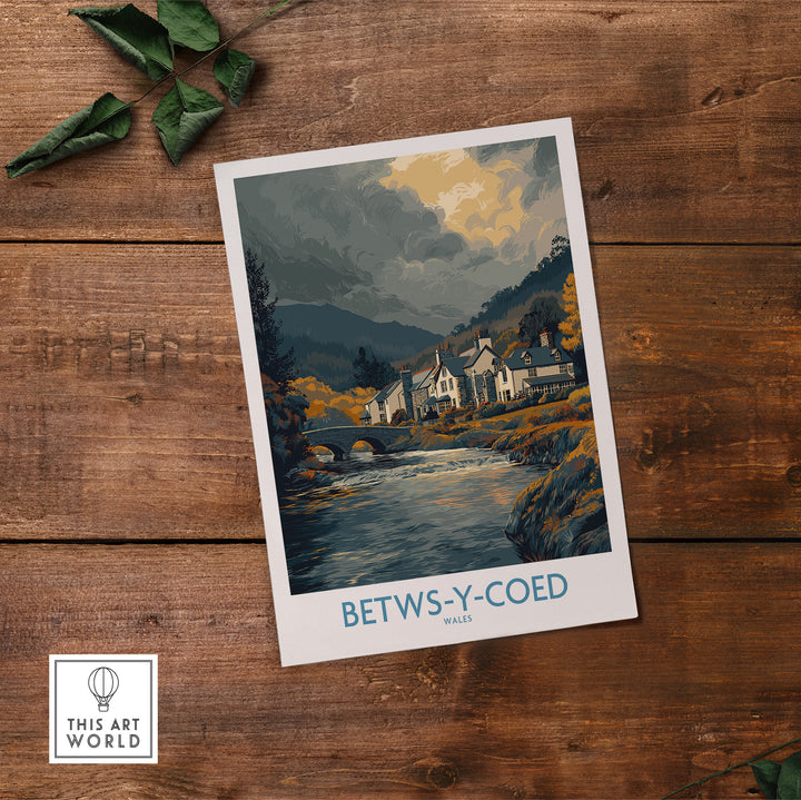 Betws-y-Coed poster showcasing the serene Welsh countryside and charming village scene with a river.