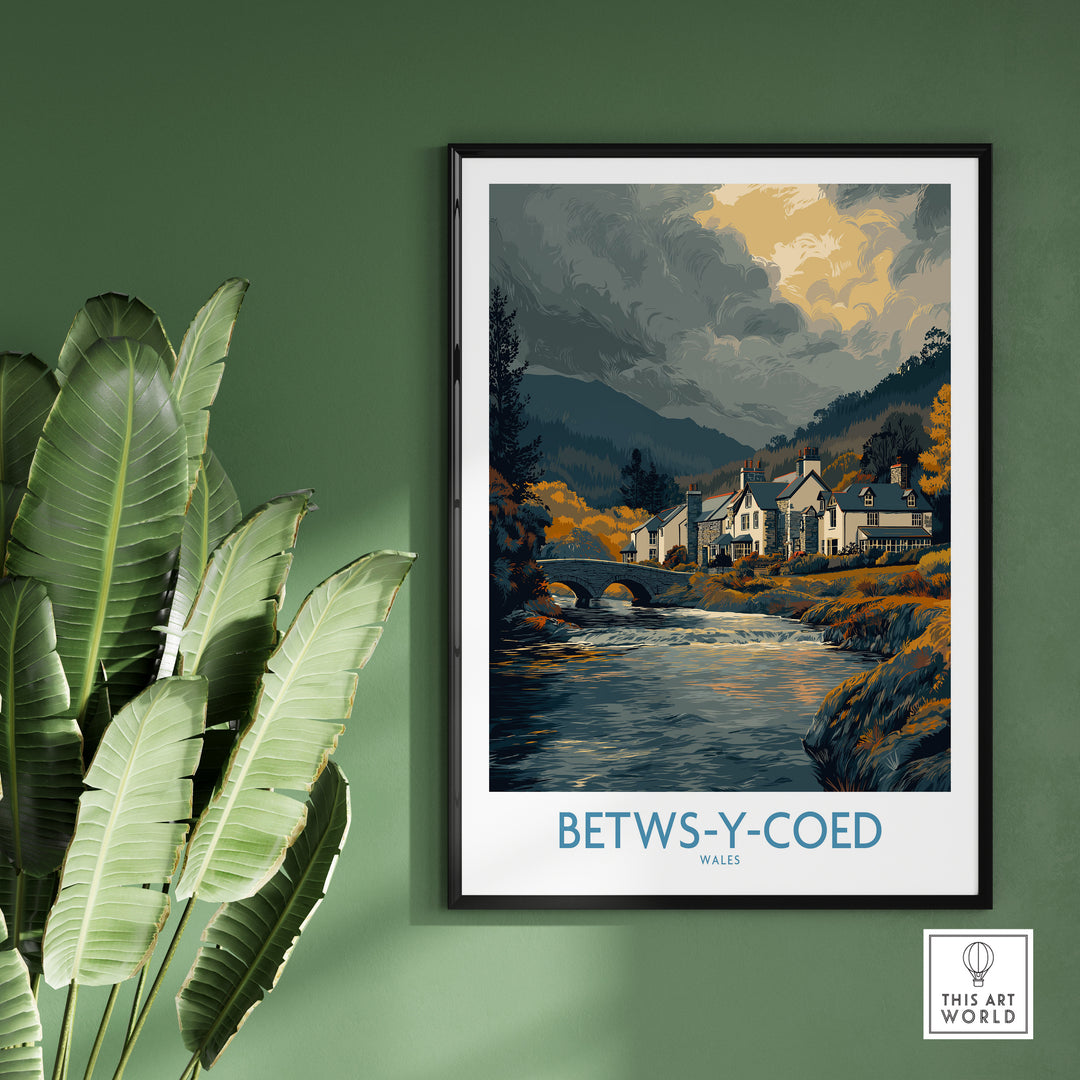 Framed Betws-y-Coed poster showcasing a Welsh countryside landscape with charming village and river scene.