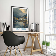 Betws-y-Coed Poster Wales Countryside Landscape Print framed on a wall above a desk in a modern interior.