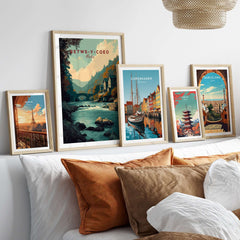 Framed artwork featuring Betws-y-Coed Travel Print Wales among other travel prints in a cozy interior setting.