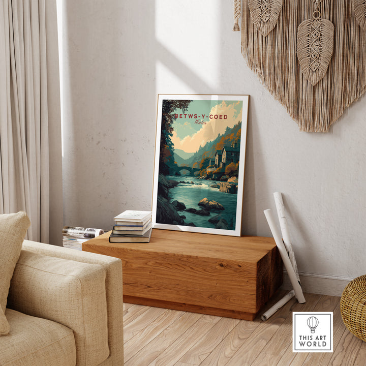 Betws-y-Coed travel print showcasing serene Welsh village scenery with river and mountains.