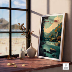 Betws-y-Coed Travel Print Wales displayed in a cozy interior with natural light and decorative elements.