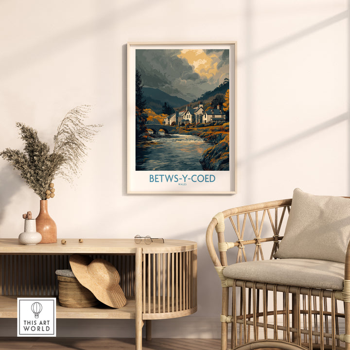 Betws-y-Coed poster featuring a scenic Welsh countryside landscape, displayed elegantly in a modern living room setting.