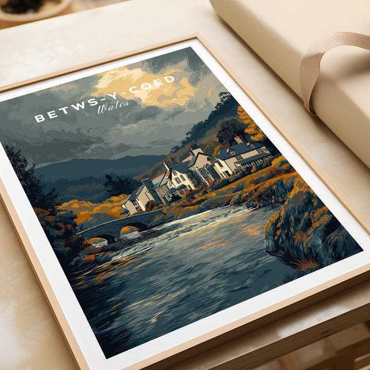 Betws-y-Coed Wales travel poster featuring a picturesque village and scenic river in Snowdonia.
