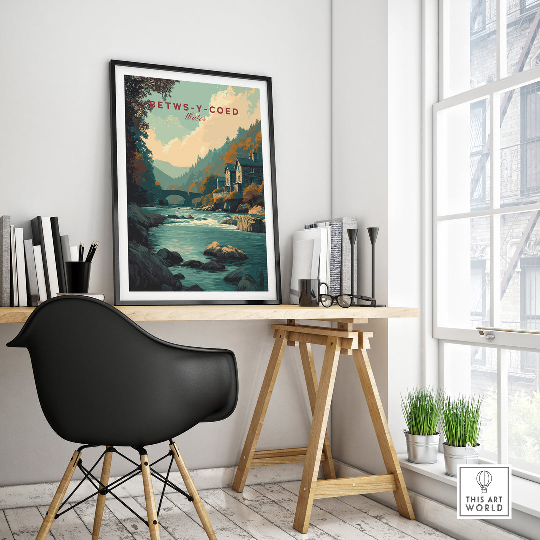 Betws-y-Coed travel print displayed in a stylish workspace, showcasing the beauty of Wales.