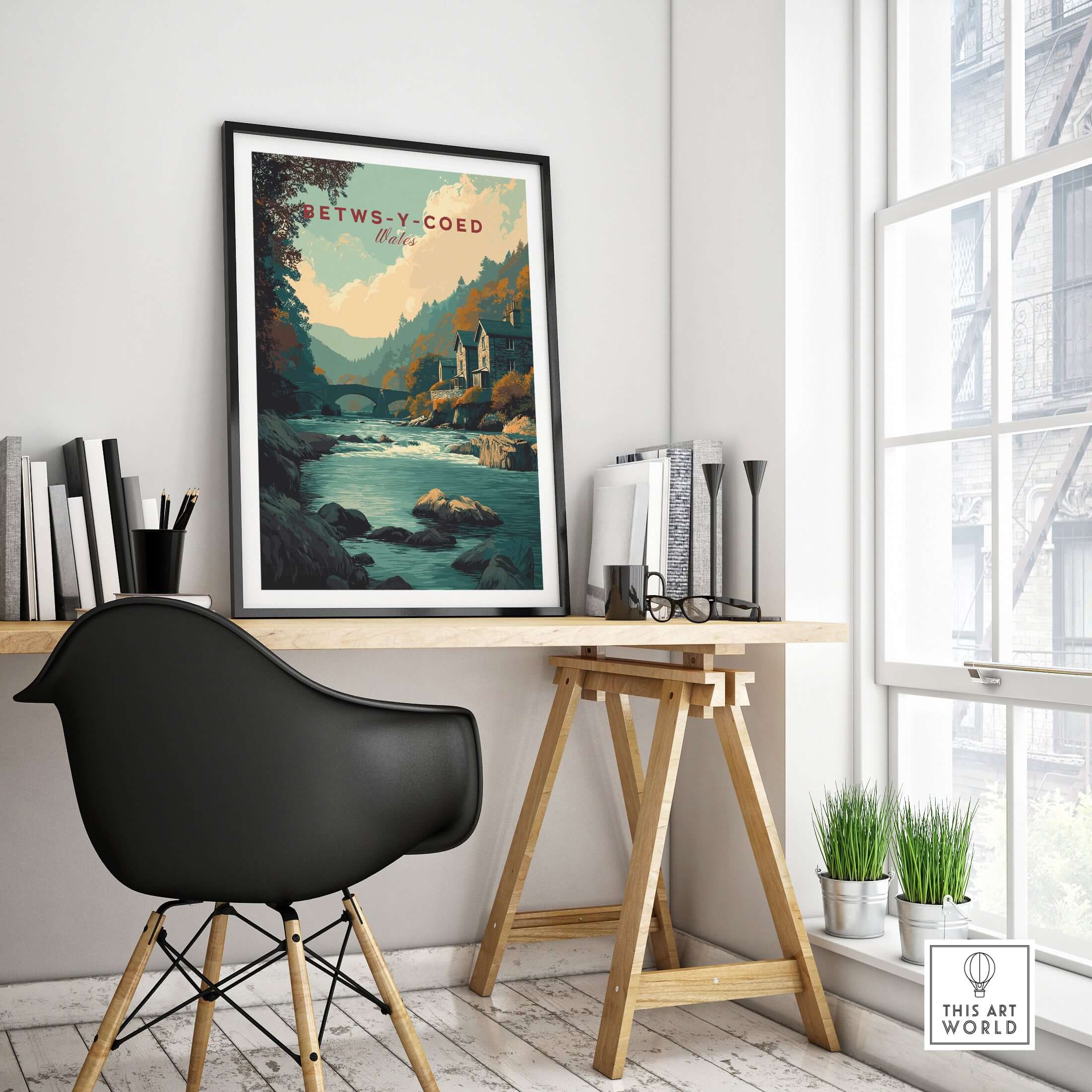 Betws-y-Coed Travel Print Wales displayed in a stylish home office, showcasing serene Welsh scenery.