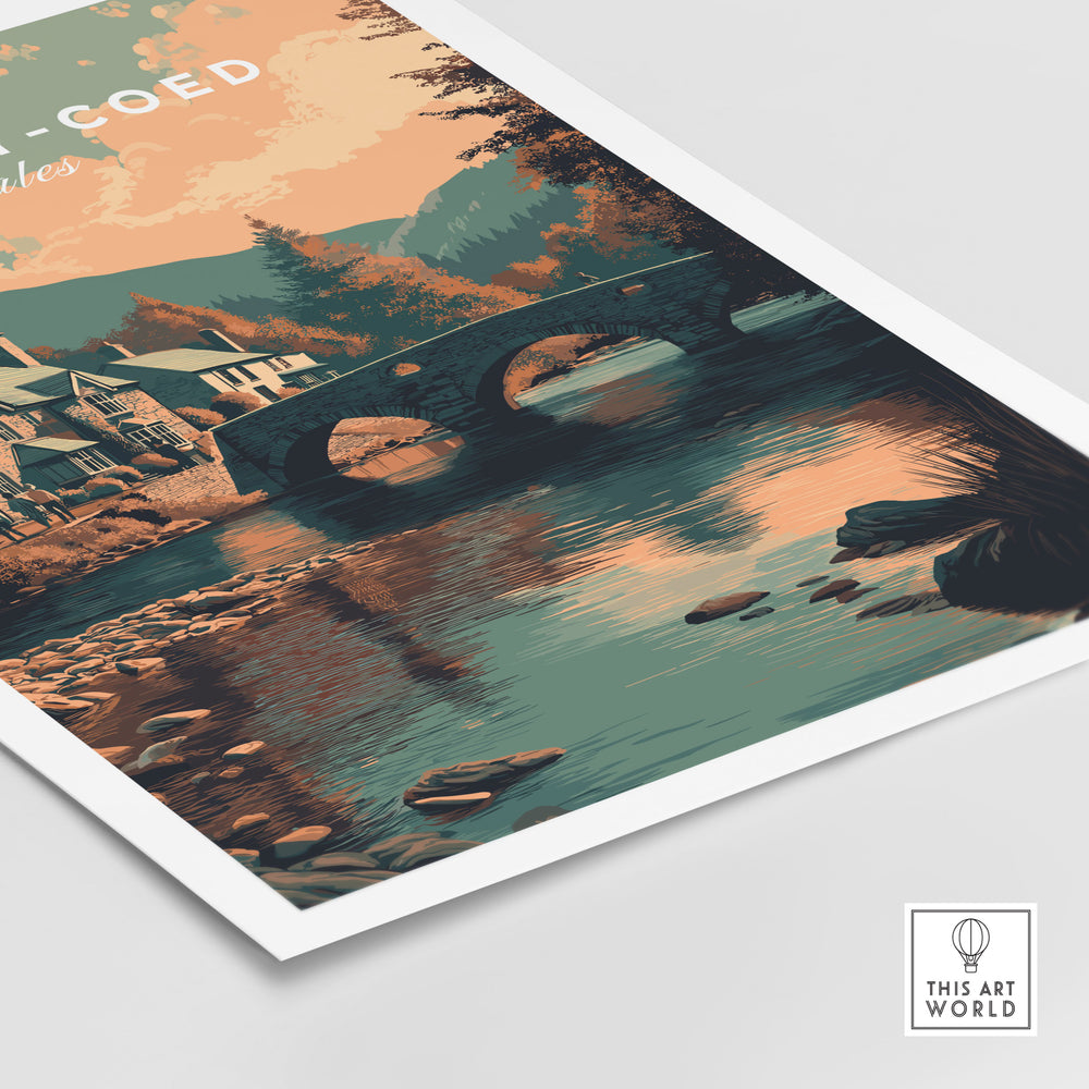 Scenic poster of Betws-y-Coed, Wales showcasing a charming bridge and village reflections in water.
