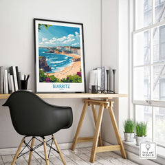 Biarritz Wall Art Print displayed in a cozy home office setting with coastal views.