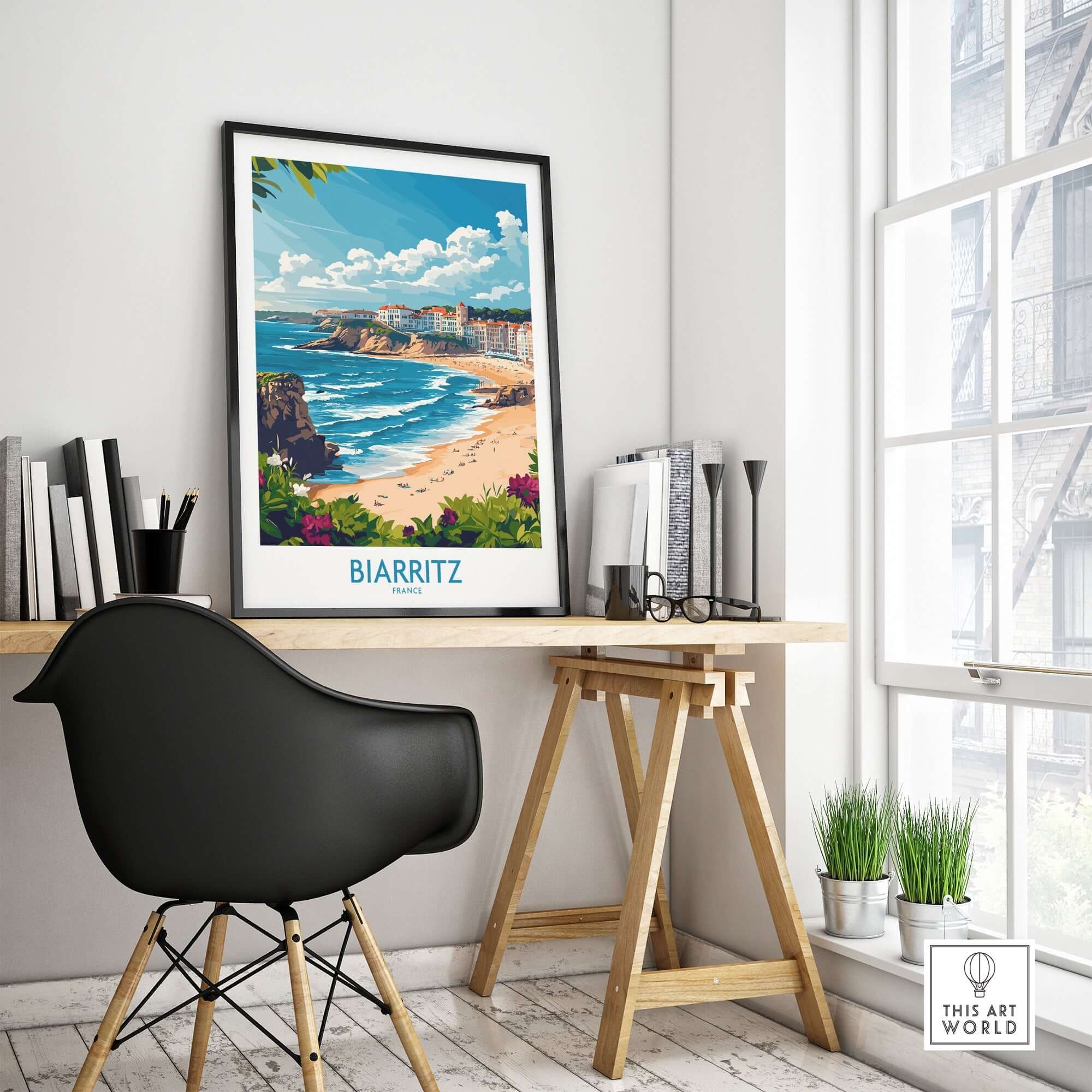 Biarritz Wall Art Print displayed in a cozy home office setting with coastal views.