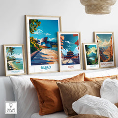 A stylish display of framed posters including the Bilbao Poster among others, enhancing home decor.