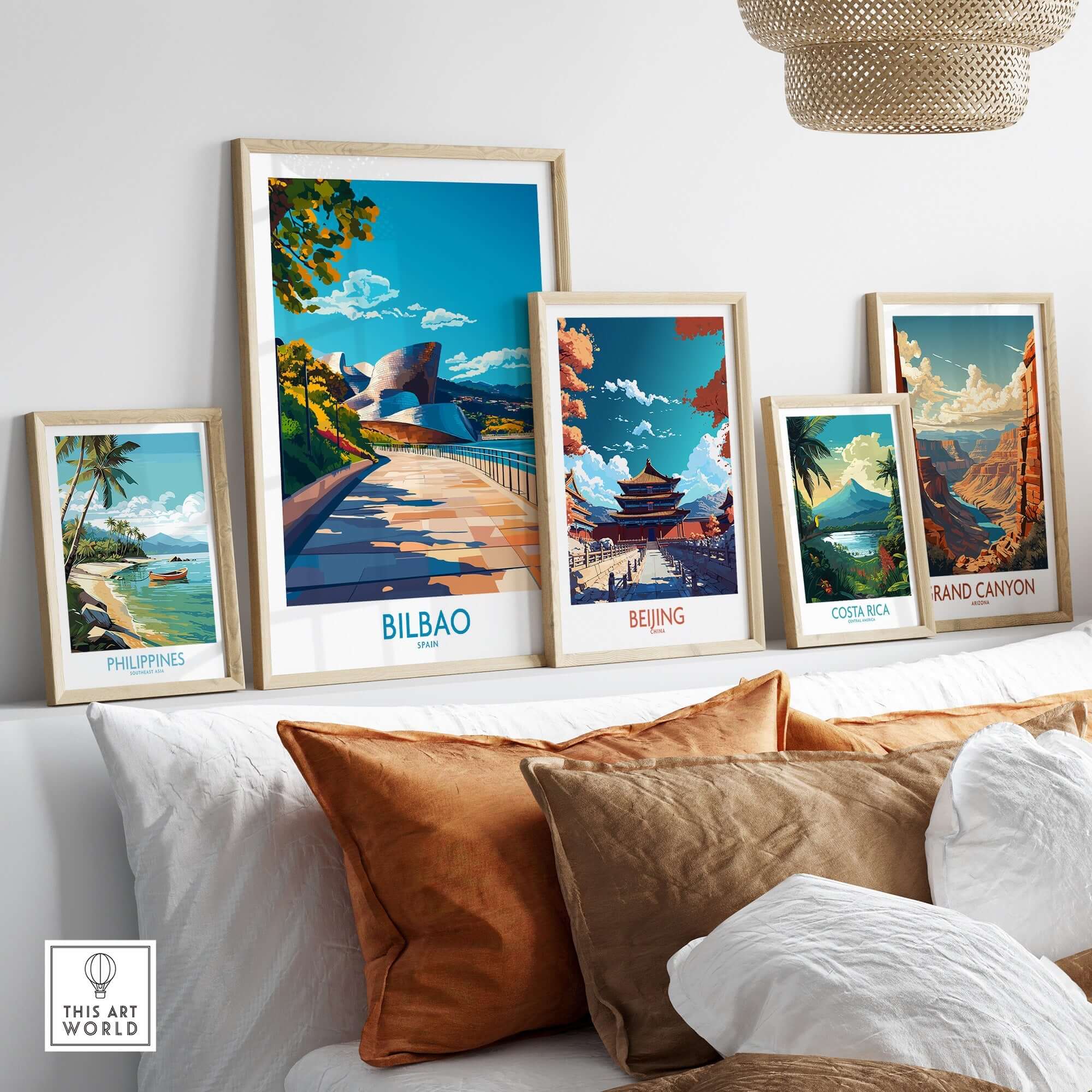 A stylish display of framed posters including the Bilbao Poster among others, enhancing home decor.