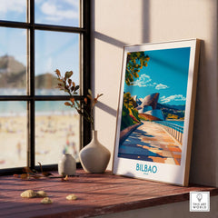 Bilbao Poster framed on a windowsill, featuring vibrant colors and scenic artwork of Bilbao, Spain.