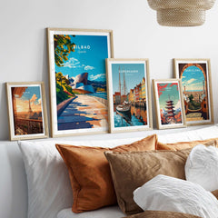 A collection of vibrant framed posters, including the Bilbao Print, showcasing colorful cityscapes and creative designs.