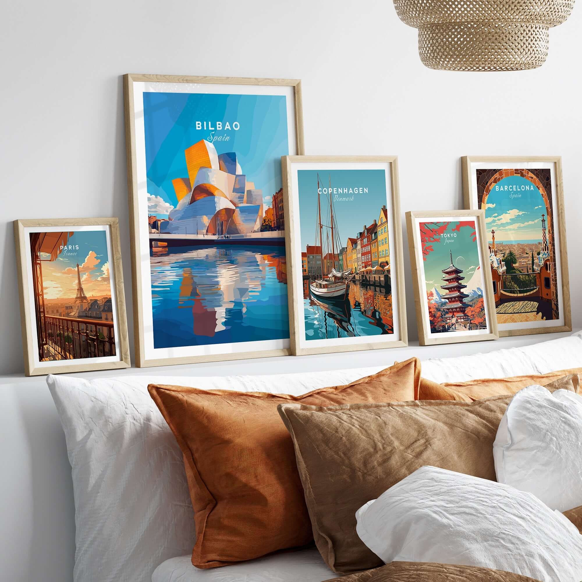 Vibrant framed Bilbao Print Spain among other city prints in a stylish living room setting.