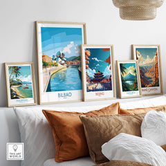 Bilbao Travel Poster displayed among various travel posters on a living room wall, highlighting vibrant designs and landmarks.
