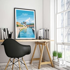 Bilbao Travel Print featuring the city's iconic landmarks beside a serene river in a modern home office setting.