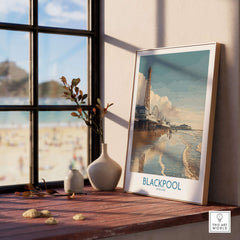 Blackpool England Pier and Tower Art Print | UK Seaside Beach Poster displayed on a windowsill with beach view.