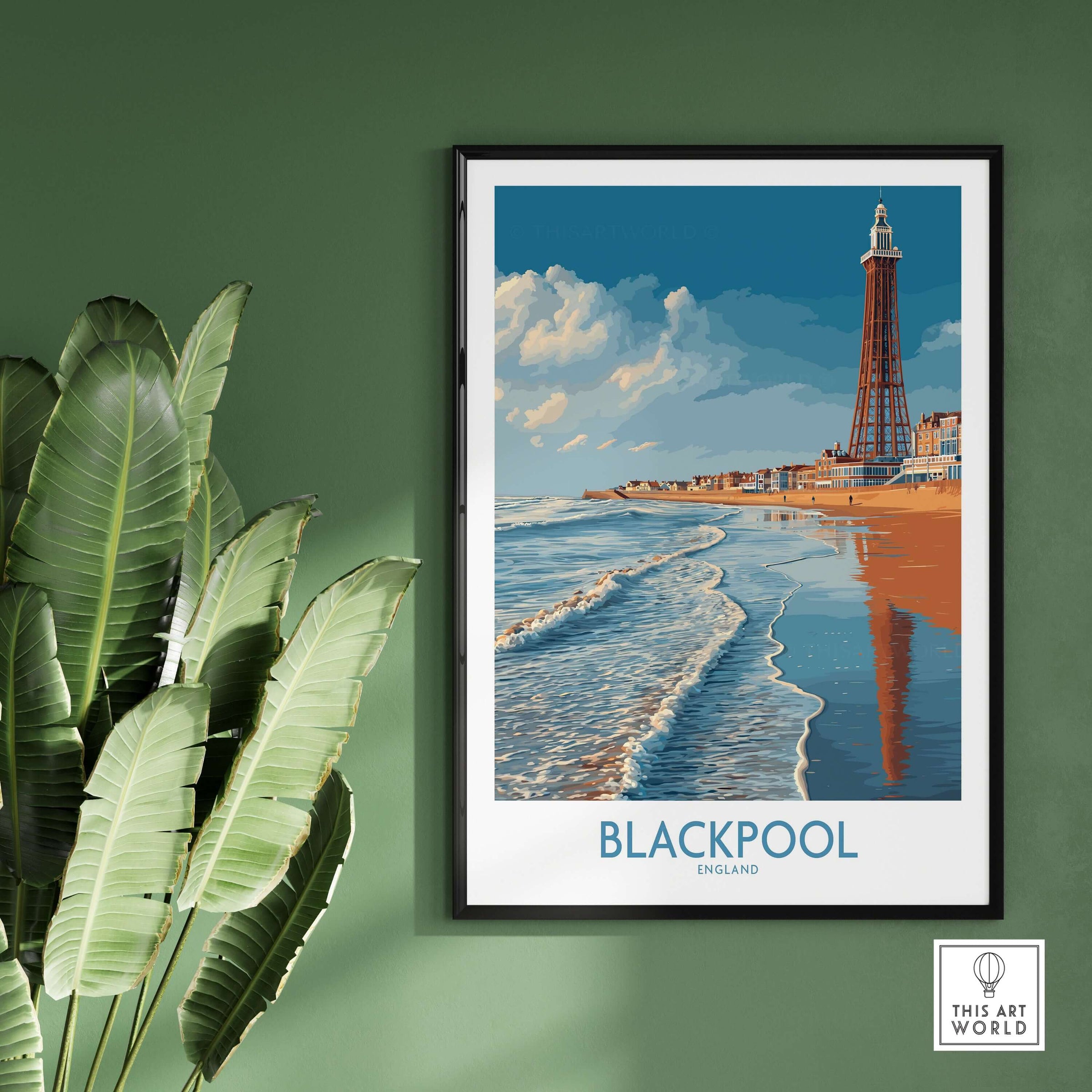 Blackpool England Tower Seascape Art Print | Beach Travel Poster framed on a wall with tropical plants.