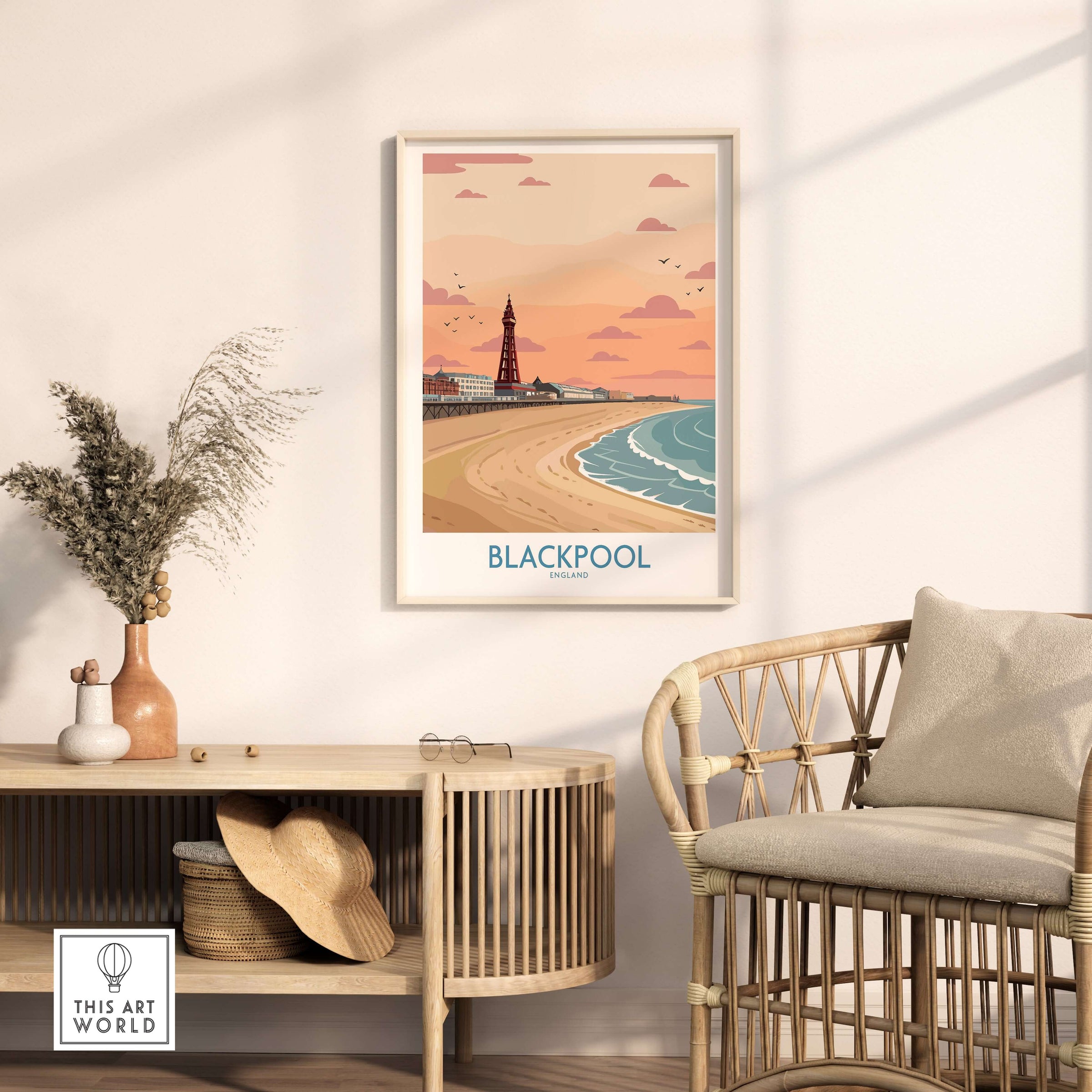 Blackpool Sunset Tower Beach Art Print | Pink Sky UK Coastal Poster displayed in a stylish living room setting.