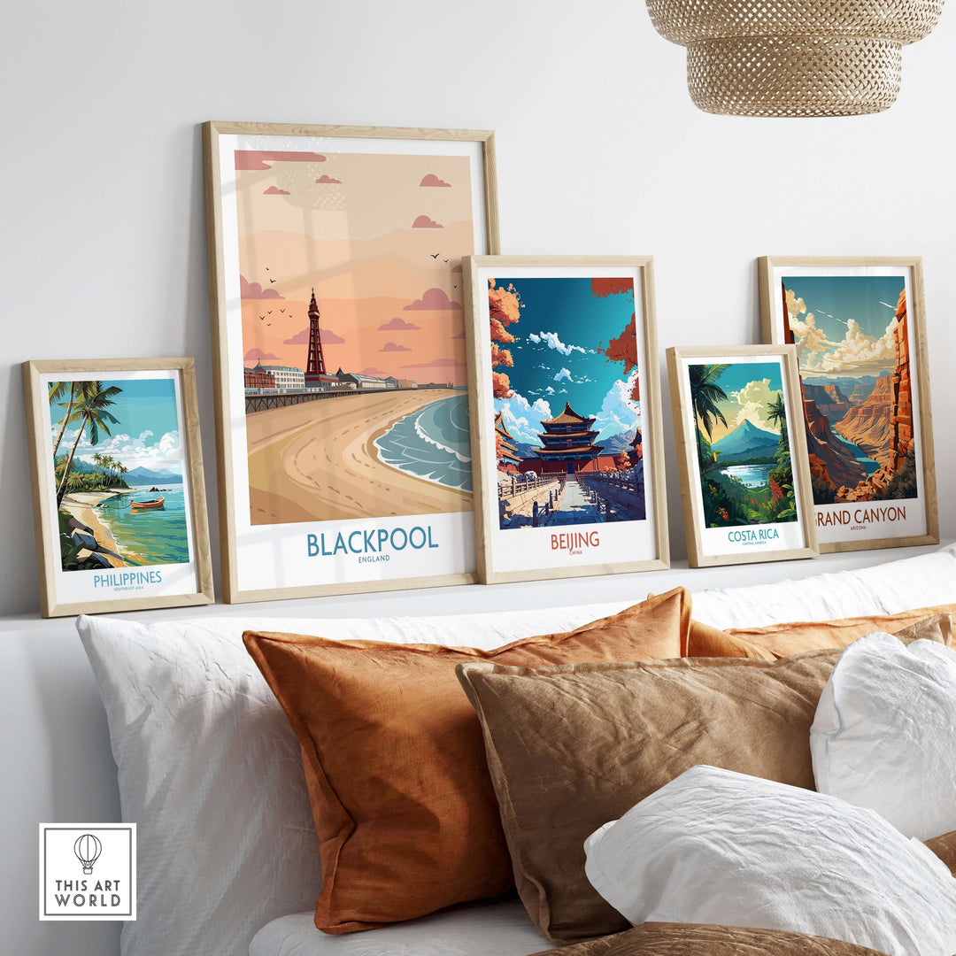 Blackpool Sunset Tower Beach Art Print | Pink Sky UK Coastal Poster displayed in a cozy living room setting with framed artworks.