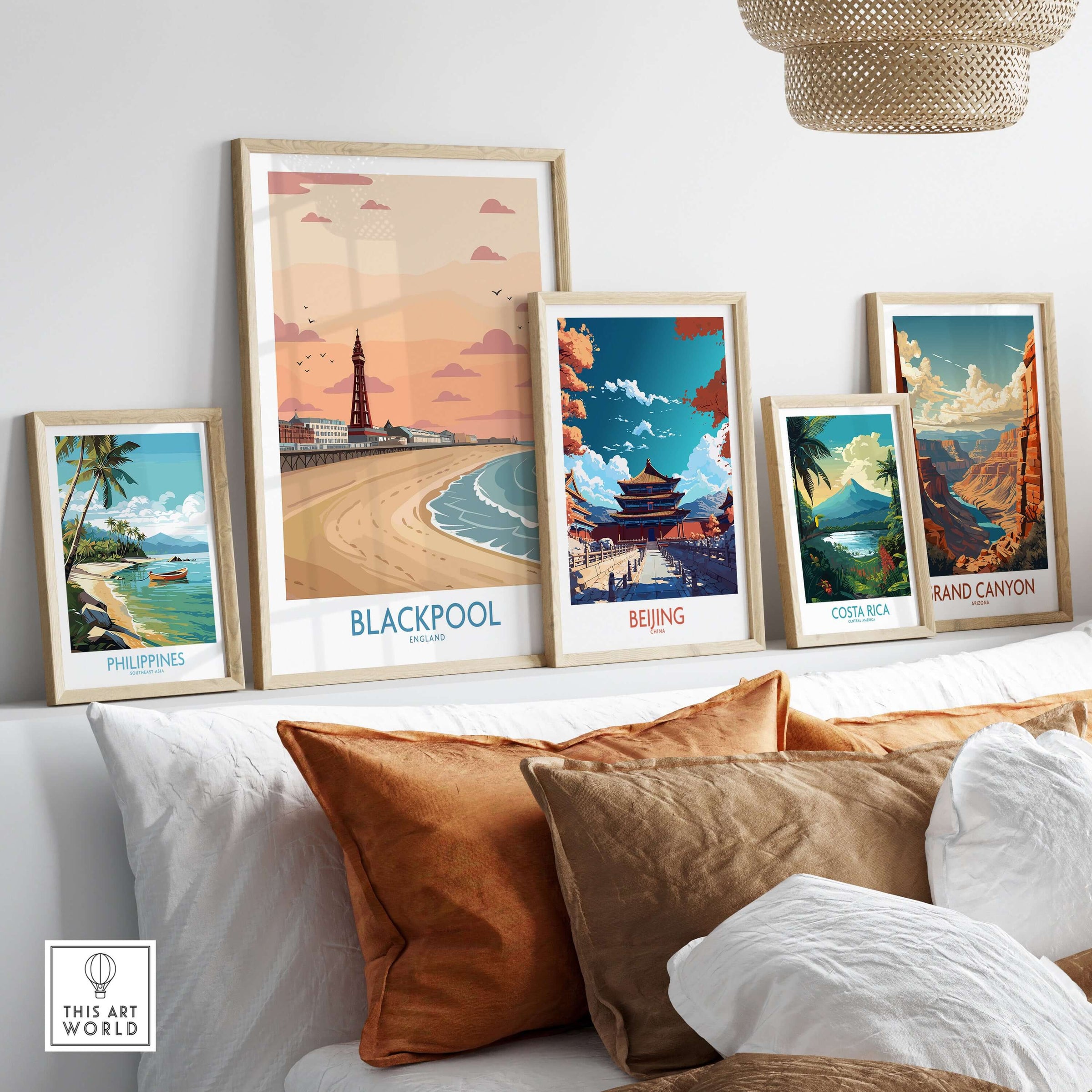 Blackpool Sunset Tower Beach Art Print | Pink Sky UK Coastal Poster displayed among other art prints.