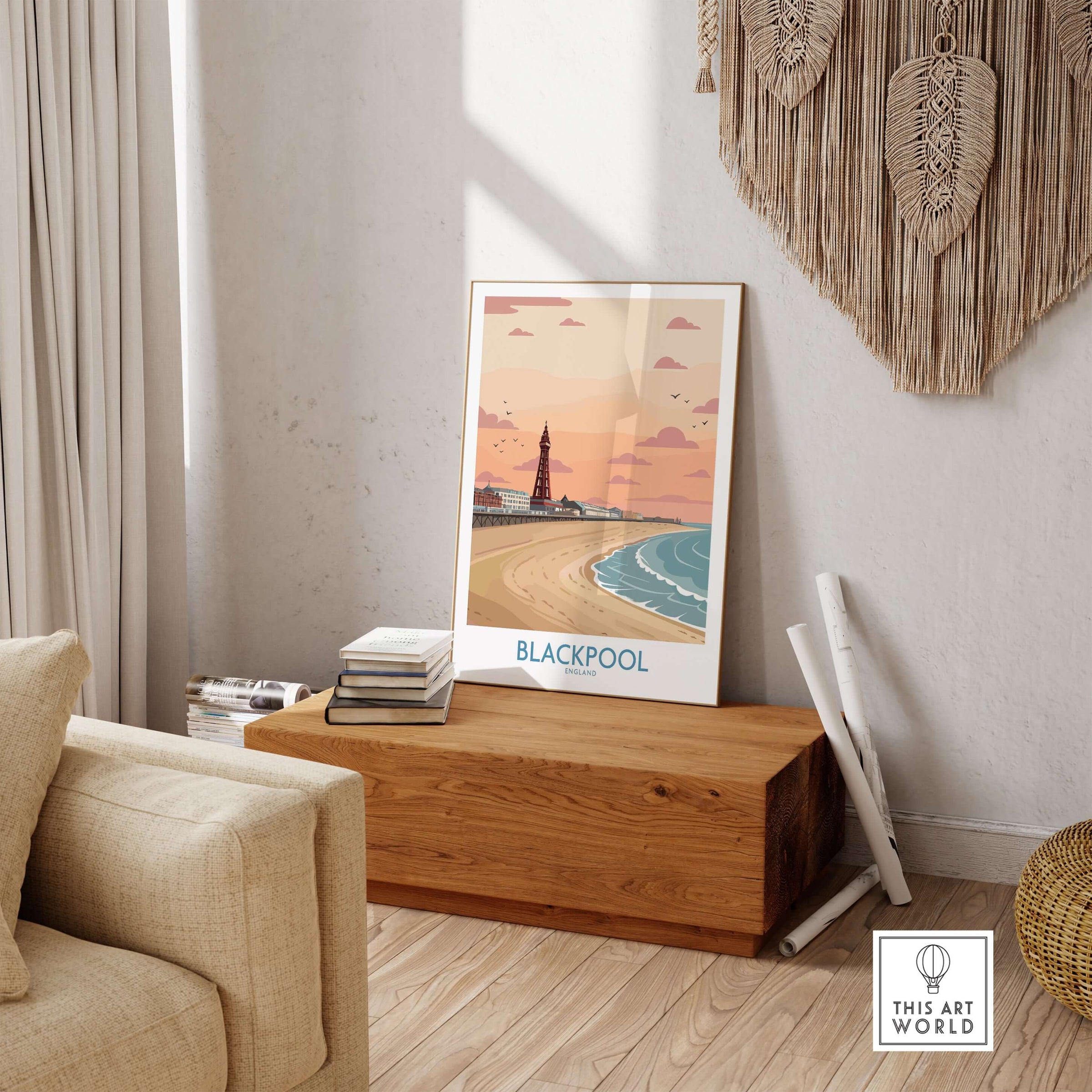 Blackpool Sunset Tower Beach Art Print | Pink Sky UK Coastal Poster displayed in living room decor.