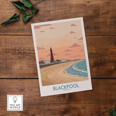 Blackpool Sunset Tower Beach Art Print | Pink Sky UK Coastal Poster on a wooden table