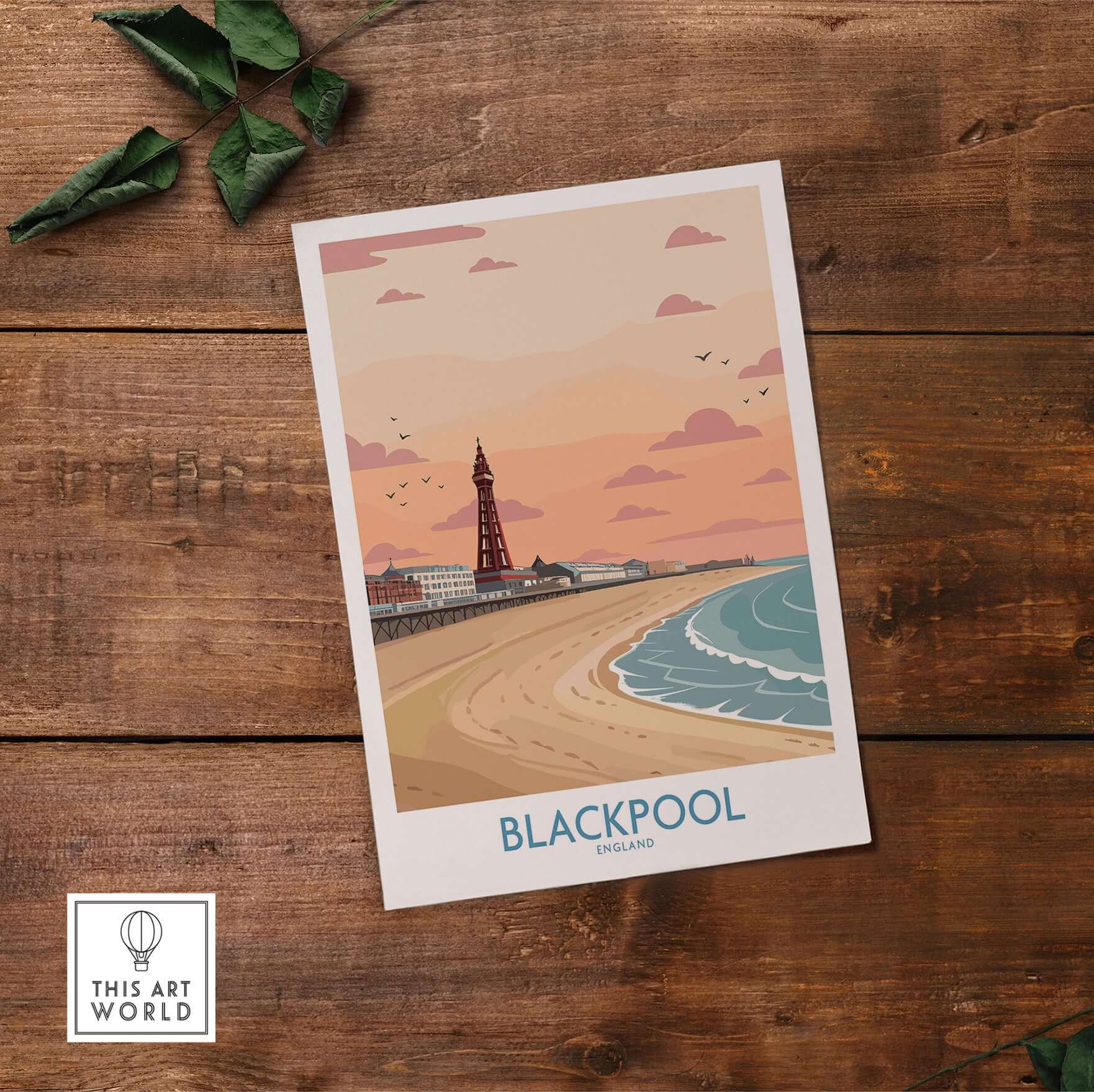 Blackpool Sunset Tower Beach Art Print | Pink Sky UK Coastal Poster on a wooden table
