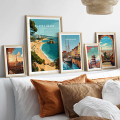 Blanes Beach Spain Travel Poster Print - Coastal Wall Art Decor displayed in a chic interior setting with other travel posters.