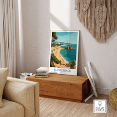 Blanes Beach Spain Travel Wall Art - Mediterranean Coast Poster displayed in a home setting with a wooden box and plant.