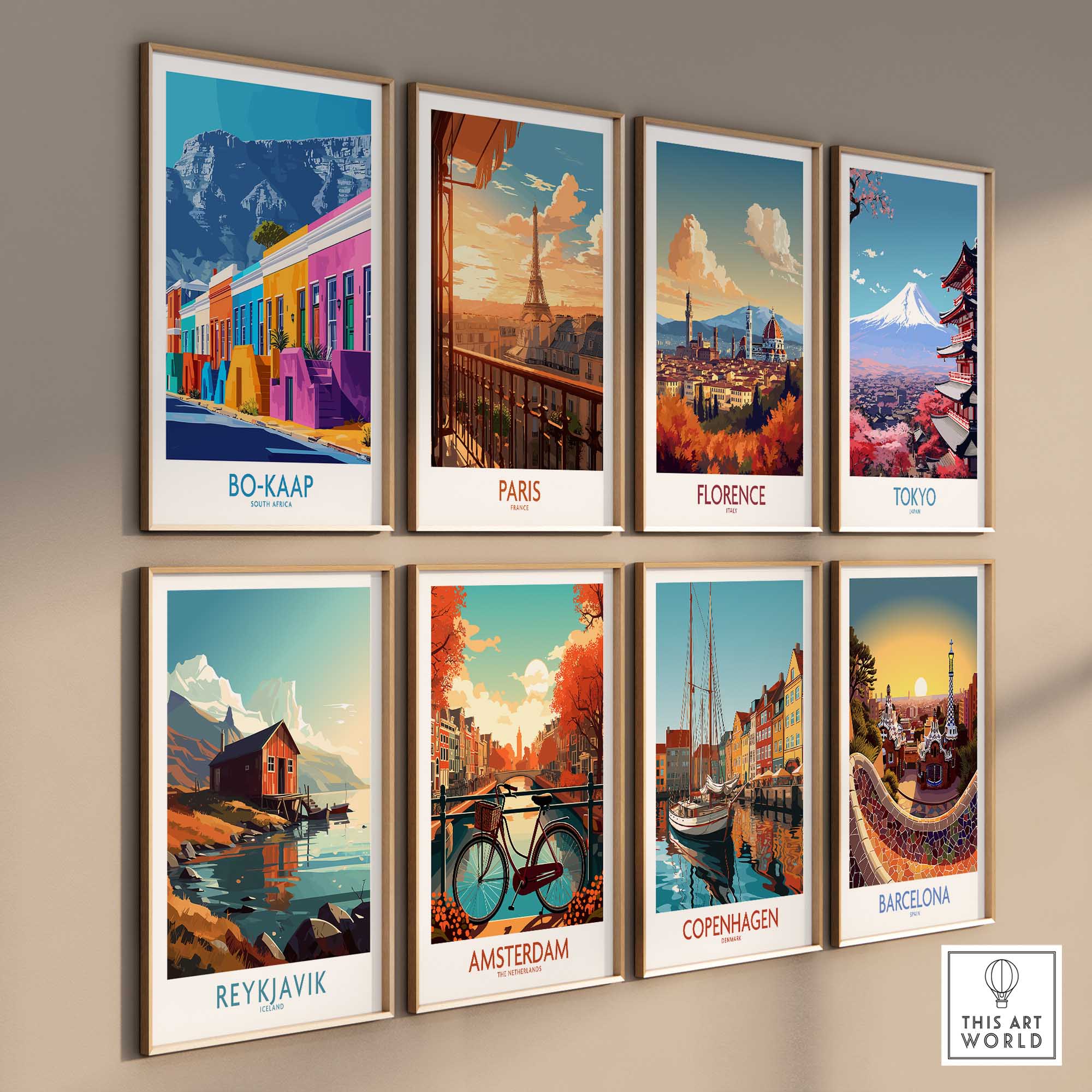 Colorful art prints of global landmarks including Bo-Kaap, Paris, Florence, and Tokyo displayed on a gallery wall.