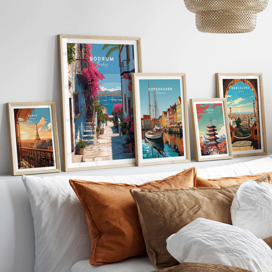Framed Bodrum Turkey wall art alongside Copenhagen and Barcelona posters, enhancing a cozy living room decor.
