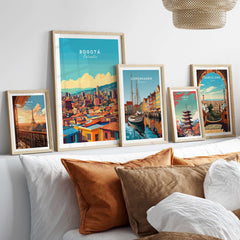 Bogota Print displayed on a wall with other city travel posters, showcasing vibrant colors and artistic design.