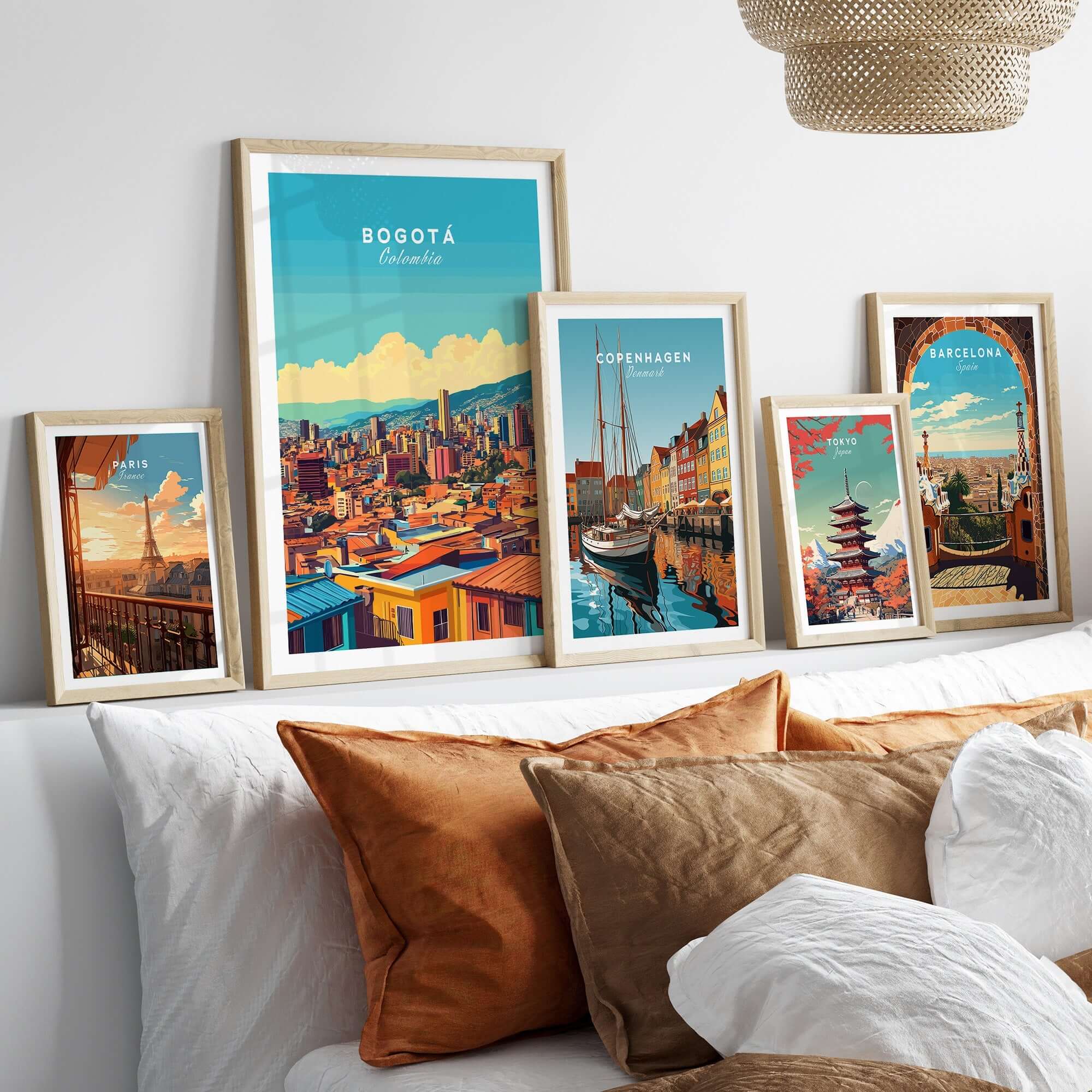 Bogota Print displayed on a wall with other city travel posters, showcasing vibrant colors and artistic design.