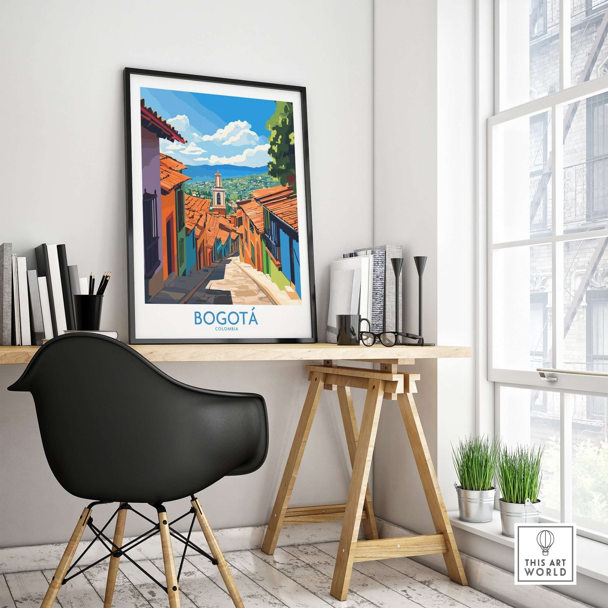 Bogota Travel Poster displayed in a modern workspace, showcasing vibrant street scene and colorful buildings of Bogota.