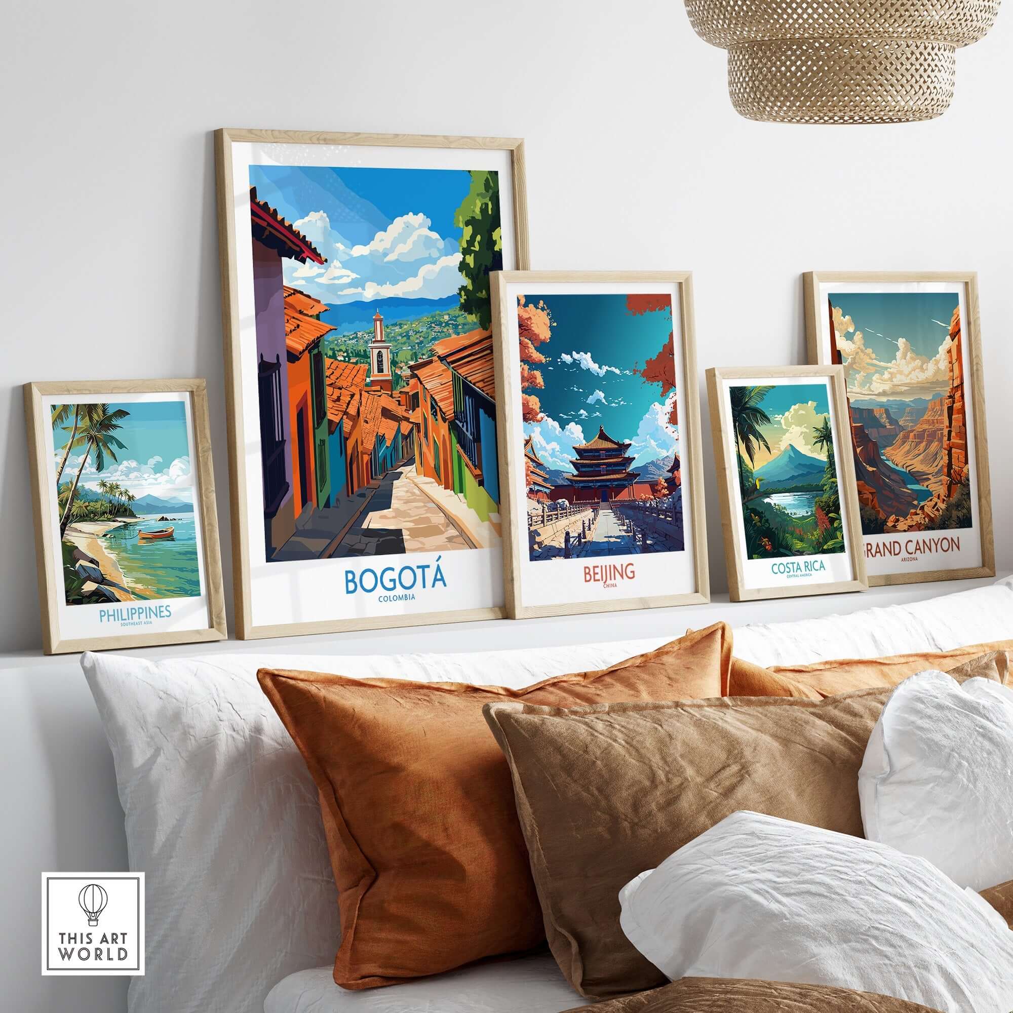 Bogota Travel Poster displayed among various travel posters on a cozy living room wall.
