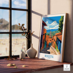 Bogota Travel Poster displayed on a windowsill, showcasing colorful streets and vibrant culture of Colombia.