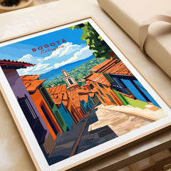 Bogota Travel Print showcasing a vibrant street scene in Bogota, Colombia, with colorful buildings and a scenic view.