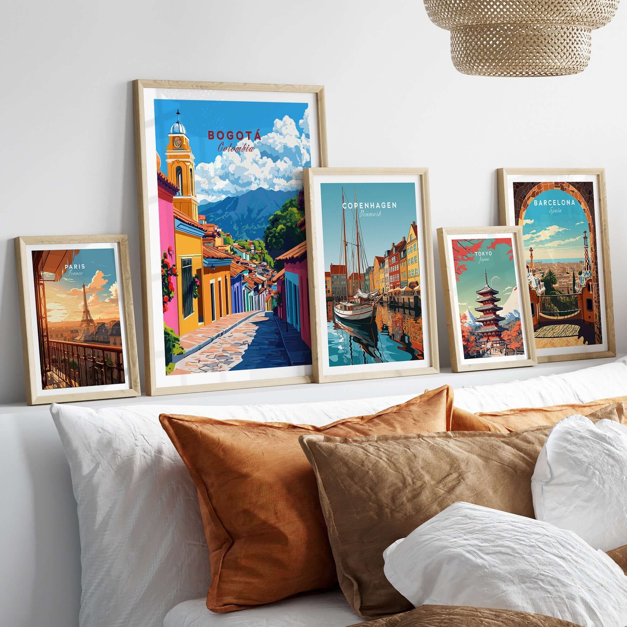 Bogota Wall Art framed print among other city-themed art pieces on a decorative wall.