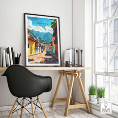 Bogota Wall Art Poster displayed in a modern workspace, showcasing vibrant city scenery.