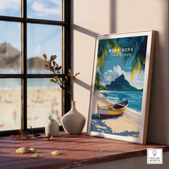 Bora Bora Art Print framed on a windowsill, showcasing a serene beach scene with tropical elements.