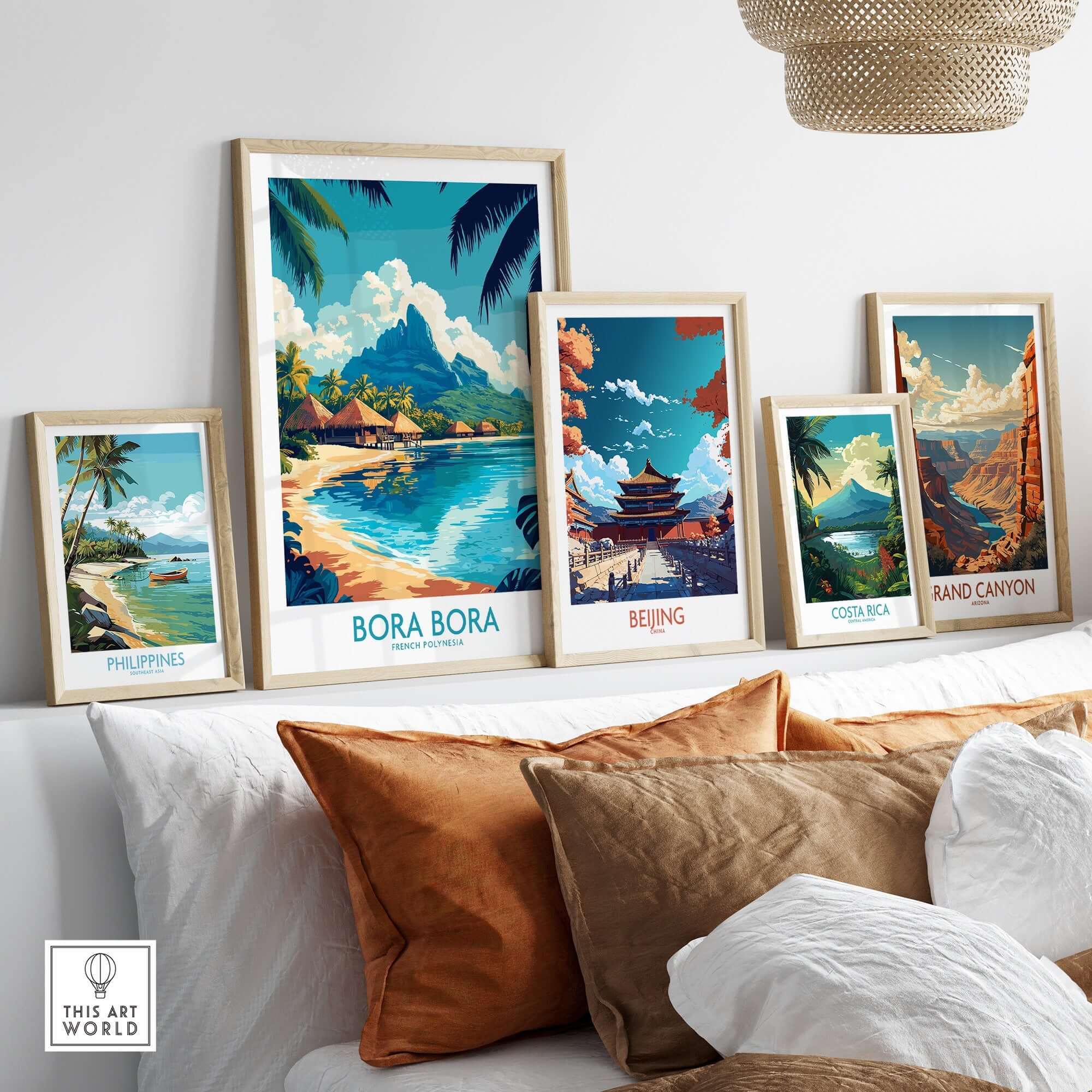 Bora Bora Wall Art Print among travel posters of Philippines, Beijing, Costa Rica, and Grand Canyon on a cozy couch