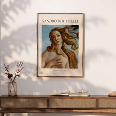 Botticelli Birth of Venus Face Detail Art Print Renaissance Iconic Poster Wall Art framed on a wall with floral decor.
