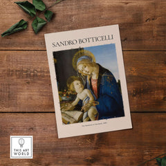 Botticelli Madonna of the Book Art Print Virgin Mary Child Religious Poster Wall Art displayed on rustic wooden background.